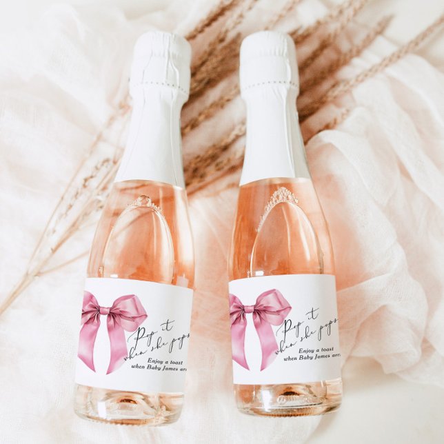 Pop it whe she Pops Pink Bow Baby Shower Sparkling Wine Label (Creator Uploaded)