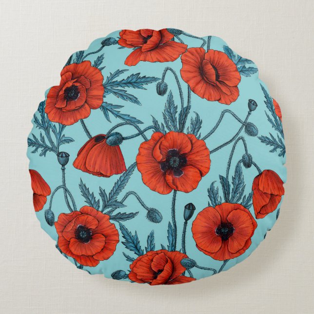 Poppies, red and blue on pool blue round cushion (Front)