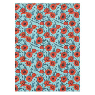 Poppies, red and blue on pool blue tablecloth