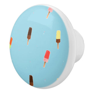 Popsicle ice cream on blue ceramic knob