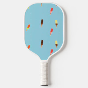 Popsicle ice cream on blue pickleball paddle