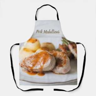 Pork medallions tenderloin with potatoes and beans apron