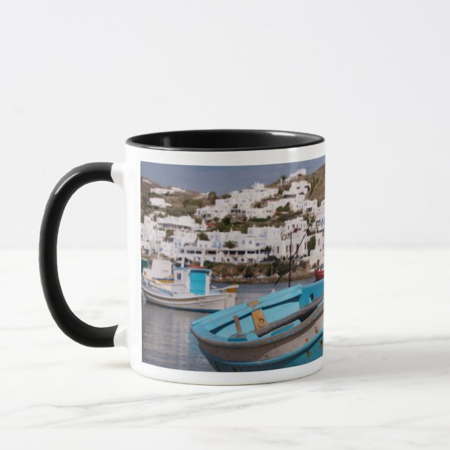 Port and harbour area with Greek fishing boats Mug (Left)