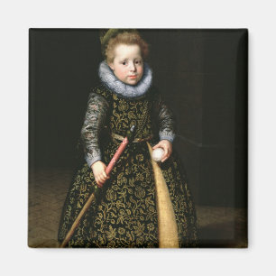 Portrait of a four-year old boy with club and magnet