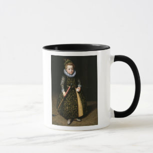 Portrait of a four-year old boy with club and mug