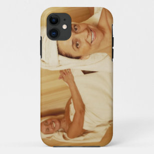 Portrait of a mature woman smiling with another iPhone 11 case