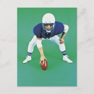 Portrait of An American Football Player Holding Postcard