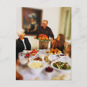 portrait of an elderly man holding a roast postcard