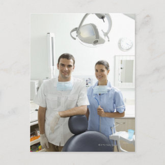 Portrait of dentist and his assistant in a postcard