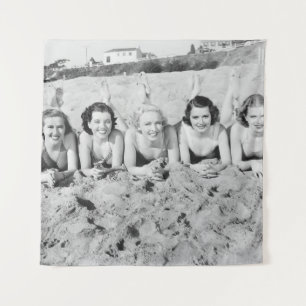 Portrait of five young women lying on the beach an tapestry