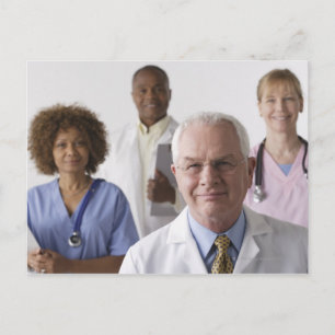 Portrait of four medical professionals, studio postcard