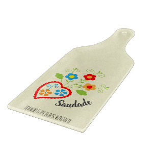 Portuguese folk heart with saudade word cutting board