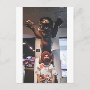 Posing with Large Lion Statue Postcard