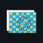 Postcard - Optical Illusion and Whale<br><div class="desc">Green and blue checkerboard with optical illusion of a 3D ball in center. Toy whale is positioned to seem to be floating through the skin of the ball.</div>