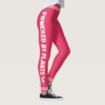 Powered by plants Vegan pink minimal Leggings<br><div class="desc">These pink leggings feature the wordings "Powered by plants" in white all caps font,  decorated with little stylized leaves and white stripes on both legs and on the waistband.</div>