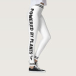 Powered by plants Vegan white black stripe minimal Leggings<br><div class="desc">These minimal white leggings feature the wordings "Powered by plants" in black all caps font,  decorated with little stylized leaves and black stripes on both legs and on the waistband.</div>