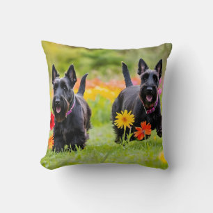 Prancing Scottish Terriers in grass and flowers Cushion