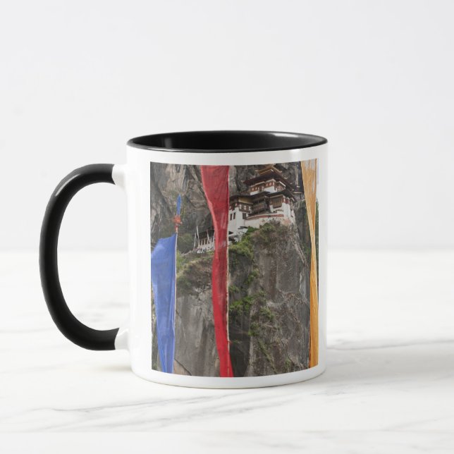 Prayer flags hang near Taktshang Mug (Left)