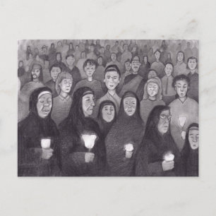 Praying by candle light in Lourdes, France Postcard