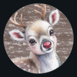 Precious White Reindeer Red Shiny Nose Birthday Classic Round Sticker<br><div class="desc">Adorable watercolor reindeer with big expressive eyes and soft blush details set against a rustic wood background. This charming woodland design is perfect for Christmas cards, holiday party invitations, winter baby showers, nursery decor, and seasonal gifts. The cosy farmhouse style paired with a sweet woodland animal makes it ideal for...</div>