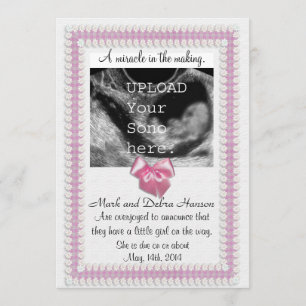 Pregnancy announcement with sonogram photo