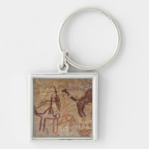 Prehistoric rock paintings with camels and key ring