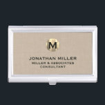 Premium Beige Linen Gold Monogram Business Card Holder<br><div class="desc">Show off your style and sophistication with this premium beige linen business card case featuring a luxurious gold monogram. Featuring a brushed gold monogram medallion with your name company and title in classic block typography, this case is a great way to keep your business cards organised and protected. The beige...</div>