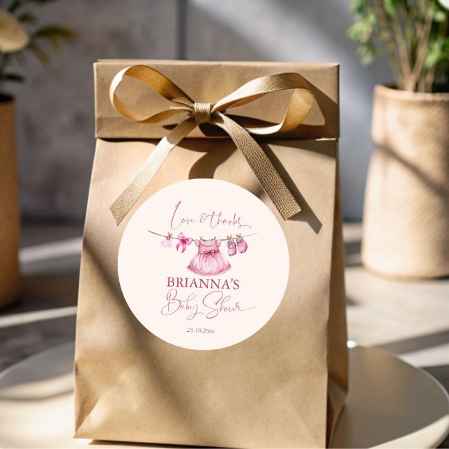 Preppy pink clothes on a line baby shower favour classic round sticker (Preppy pink clothes on a line baby shower thank you favor sticker template baby shower favors)