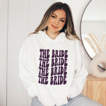 Preppy Purple Trendy Groovy Disco Bride Custom Sw Hoodie<br><div class="desc">Are you looking for the perfect bachelorette party shirt? Look no further than this personalised purple disco hoodie sweatshirt! This unique hoodie is perfect for any bride-to-be who wants to look stylish and chic on her big day. Not only is this hoodie comfortable and stylish, but it makes a great...</div>