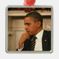 President Barack Obama reflects as he meets