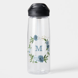 pretty blue flowers greenery  water bottle