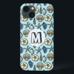 Pretty Blue Shell Starfish Sea Pattern Monogram iPhone 13 Case<br><div class="desc">Add your own monogram / initials to this pretty, blue and cream seashell and starfish pattern that conjures up images of the beach and summer. There are five varieties of shells in the design and one starfish. Perfect for nautical / beach / ocean / coastal theme decor. The light blue...</div>