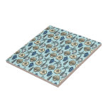 Pretty Blue Shell Starfish Sea Pattern Tile<br><div class="desc">This pretty, blue and cream seashell and starfish pattern conjures up images of the beach and summer. There are five varieties of shells in the design and one starfish. Perfect for nautical / beach / ocean / coastal theme decor. The light blue background colour can be customised to whatever you'd...</div>