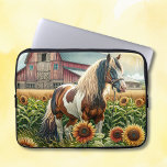 Pretty Brown and White Horse on Rustic Farm Laptop Sleeve<br><div class="desc">Pretty brown,  white and black spotted Pinto horse standing in front of an old rustic barn surrounded by sunflowers as the sun rises at dawn.</div>