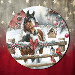 Pretty Brown and White Horse Rustic Farm Christmas Classic Round Sticker<br><div class="desc">Christmas stickers. Ai watercolor illustration of a scene on a rustic farm with a brown and white painted or pinto horse and cardinals and a wood fence decorated in pine cones,  berries and garland on a Christmas winter day.</div>