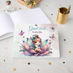 Pretty fairy sitting inside flower guest book
