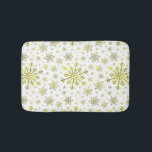 Pretty Gold Christmas Snowflakes on Winter White Bath Mat<br><div class="desc">Mixed sized pretty yellow gold snowflakes are scattered throughout this Christmas seasonal pattern. This cute festive design with a crisp winter white background is sure to please any age and perfect for anyone who likes soft and delicate xmas patterns.</div>