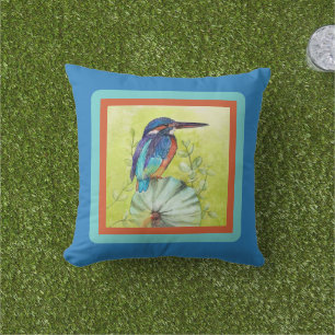 Pretty painted hummingbird on blue cushion