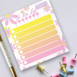 Pretty Simple Floral Pink Orange Yellow To Do List Notepad<br><div class="desc">This personalised To Do List notepad allows you to keep track of the things you need to do every day. The design consists of simple flowers in purple, pink and yellow on a white background and in the centre there are seven blank areas in shades of pink, orange and yellow...</div>
