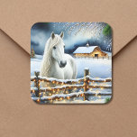Pretty White Horse Farm Christmas  Square Sticker<br><div class="desc">A pretty white horse standing behind an old rustic wood fence with a snowy background and vintage old red barn. The snow-filled fence is adorned with illuminated Christmas lights to give a warm festive feel to your country Christmas stickers. Pretty to seal your Christmas cards with.</div>