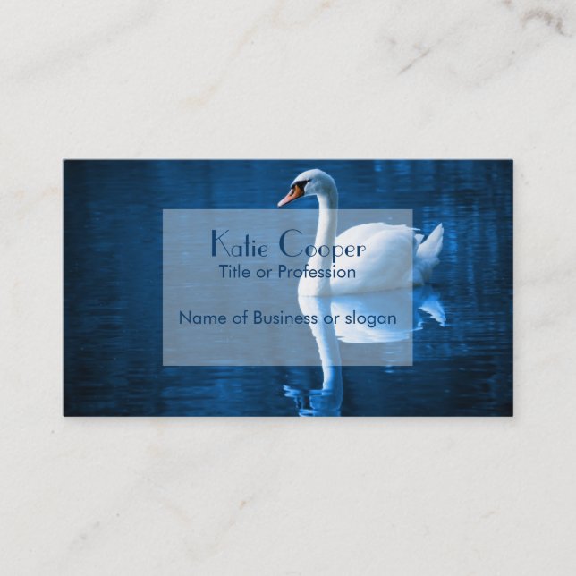 Pretty white swan floating on a blue lake business card (Front)