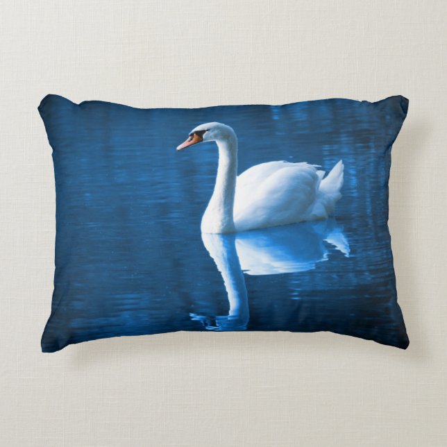 Pretty white swan floating on a blue lake decorative cushion (Front)