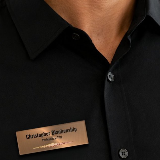 Professional Faux Copper Metallic Custom Name Tag (Copper color template name tag with flare and size fading beads at bottom on a black shirt.)
