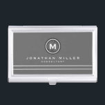 Professional Grey & White Monogram Medallion Business Card Holder<br><div class="desc">Professional business card holder features simple grey and white design with a stylised monogram medallion in black and white with modern typography, with custom name and title or role in a coordinating white typography on a grey background with two complimentary white stripes to balance the overall design. Shown with personalised...</div>
