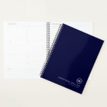 Professional Navy & White Monogram Initial Planner<br><div class="desc">Modern planner features a minimal design in a classic navy blue and white colour palette. Custom name presented in the lower right hand corner in stylish simple font with a complimentary minimal monogram medallion. Shown with a custom name and monogram initial on the front in modern typography, this personalised business...</div>