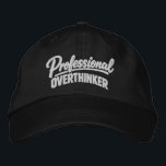 Professional Overthinker Funny Humor Embroidered Hat<br><div class="desc">Professional Overthinker Funny embroidered cap from Ricaso - Show off your sense of humor with the “Professional Overthinker” text-based design — perfect for anyone whose mind never quite switches off. Simple, bold typography delivers the joke instantly, making it relatable for thinkers, planners, worriers, and anyone who tends to analyze things...</div>