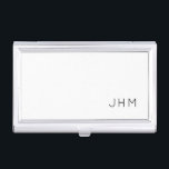 Professional White Minimalist Monogrammed Business Card Holder<br><div class="desc">Professional business card holder features sleek minimalist design in a black and white colour palette. Custom monogram initials presented simple black typography on a plain white background; positioned lower right-hand corner. Shown with personalised monogram initials in a simple classic modern font, this executive business card holder is designed as a...</div>