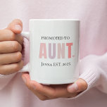 Promoted to Aunt EST 2025 | Personalised New Aunt Two-Tone Coffee Mug<br><div class="desc">Celebrate a beautiful new role with this adorable “Promoted to Aunt” EST 2025 custom mug. Perfect for announcing a new arrival or gifting a proud first-time aunt, this design features soft pastel text and the option to personalise with the name of the aunt and the year. Ideal for pregnancy reveals,...</div>