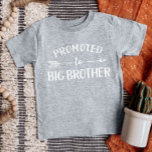 Promoted to Big Brother Pregnancy Announcement Baby T-Shirt<br><div class="desc">Custom printed apparel personalised with "Promoted to Big Brother" graphic in trendy modern fonts with a boho arrow design. Perfect for a pregnancy announcement photo or a gift for older siblings when new baby arrives! Use the design tools to edit the colours or add your own text and photos to...</div>