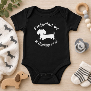 Protected by a Dachshund - Baby Wiener Dog Lover B Bodysuit